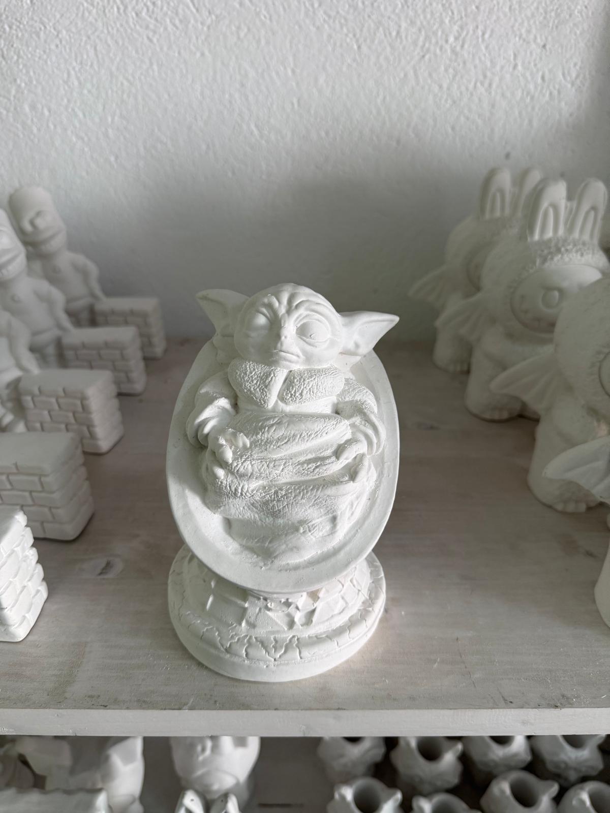 Baby Yoda en Cuna